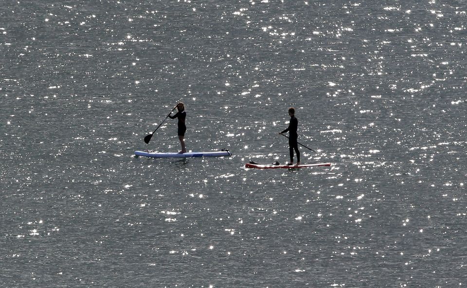 The definition of bathers could be expanded to use other water users such as paddle boarders (Owen Humphreys/PA)