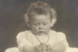 thumbnail: Princess Elizabeth (who became Queen Elizabeth II) playing with Victorian glasses. The Royal Collection © Her Majesty Queen Elizabeth II