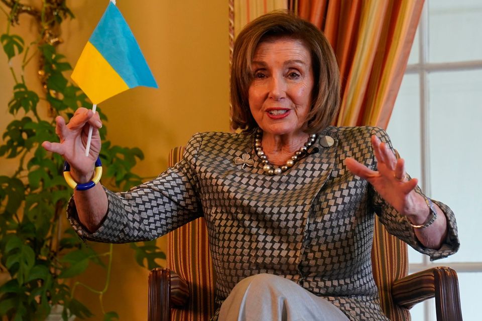 Visit: Former Speaker of the US House of Representatives Nancy Pelosi holds a Ukrainian flag during a meeting in Phoenix Park, Dublin, yesterday