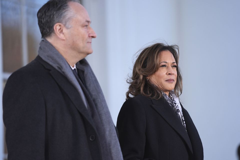 Vice President Kamala Harris and second gentleman Doug Emhoff stand before greeting Vice President-elect JD Vance and Usha Vance (Evan Vucci/AP)