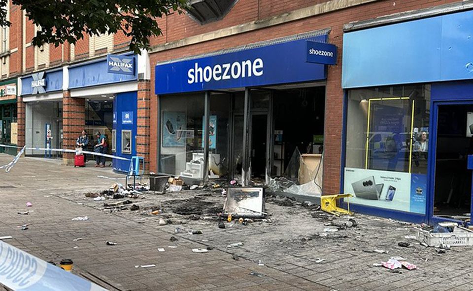 The Shoezone store was also looted (Olly Burdett/PA)