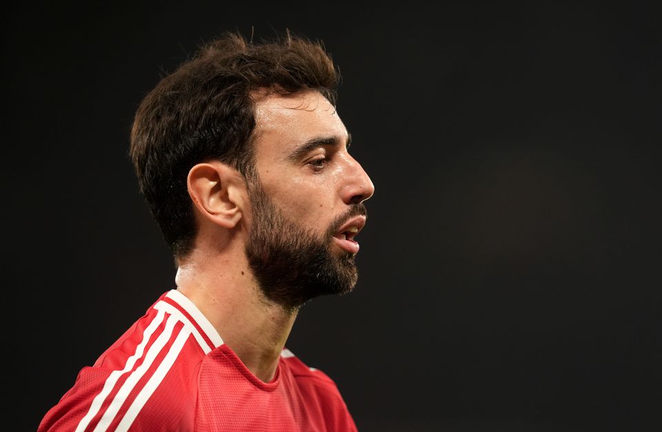 Manchester United’s Bruno Fernandes helped an unwell passenger on a plane (Martin Rickett/PA)