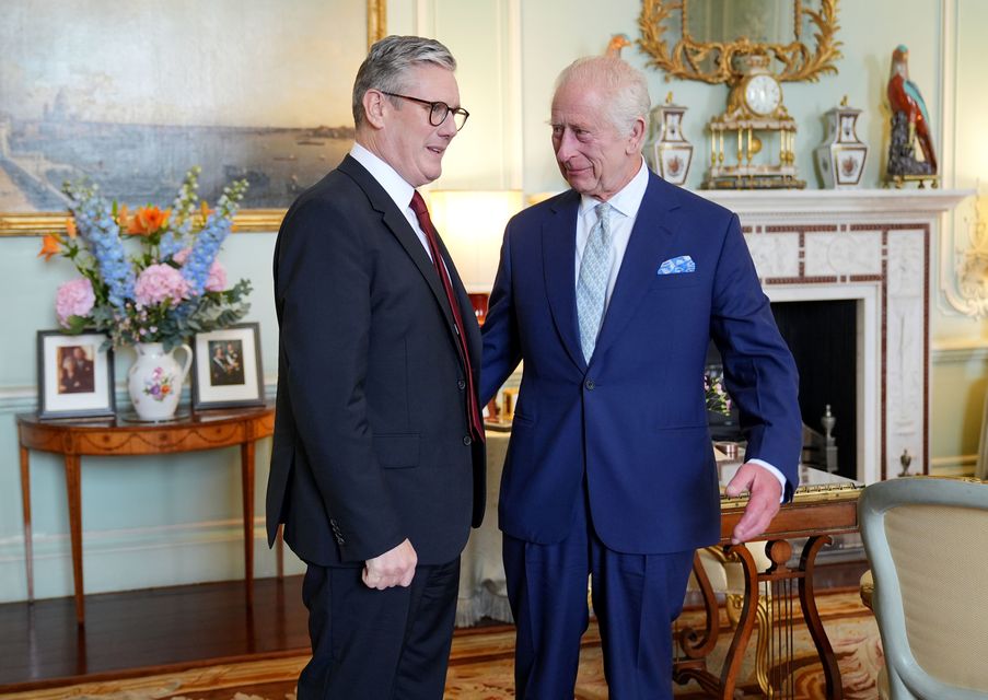 The King speaks with Sir Keir Starmer during an audience at Buckingham Palace, London, where he invited the leader of the Labour Party to become Prime Minister (Yui Mok/PA)