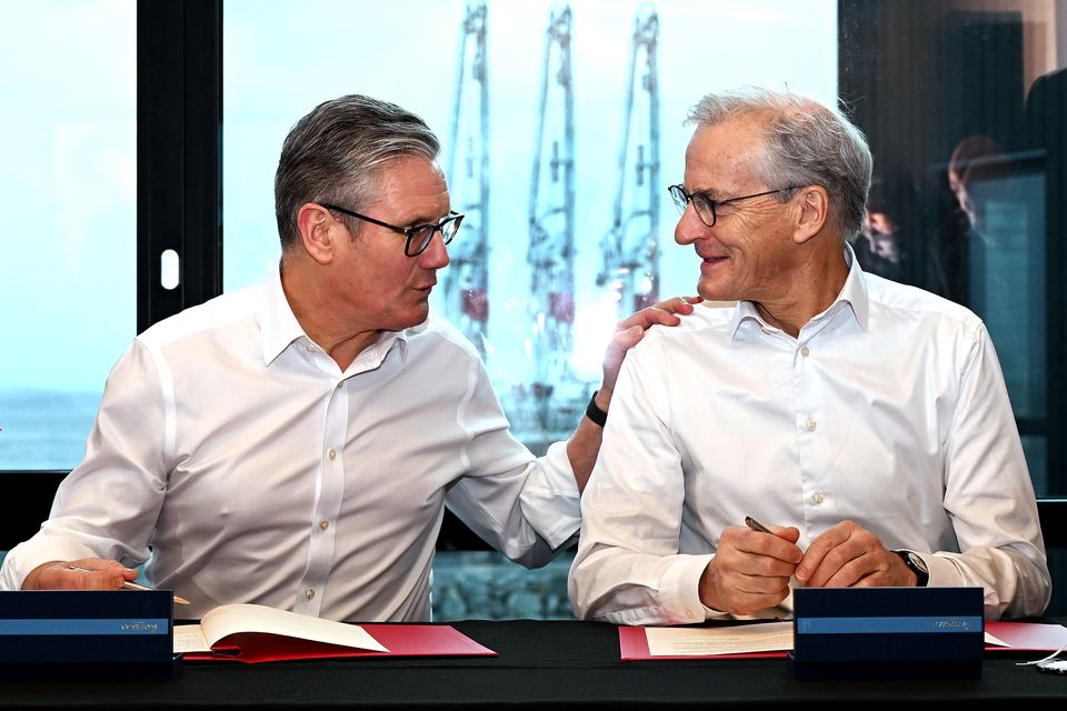 Prime Minister Sir Keir Starmer signs and swaps a Strategic Partnership Agreement with Norwegian Prime Minister Jonas Gahr Store in Bergen, during a trip to Norway (Leon Neal/PA)