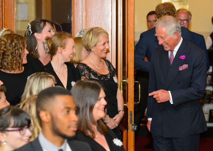 Charles as the Prince of Wales meeting members of the Military Wives choir at a Business in the Community event in 2014 (Dominic Lipinski/PA)