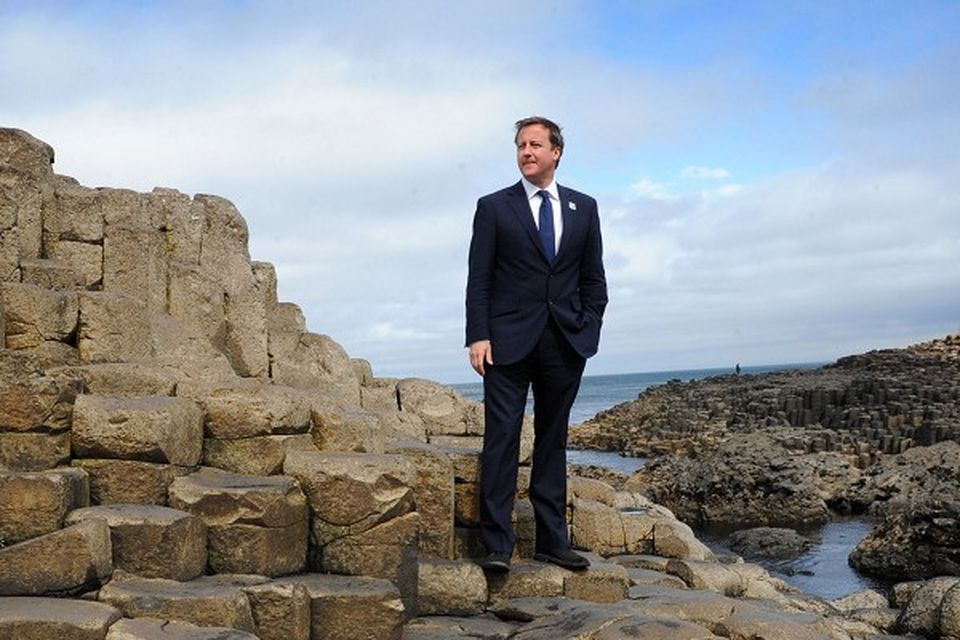 Prime Minister David Cameron stands on the Giant's Causeway in County Antrim