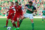 thumbnail: Belarus' Igor Shitov (left) and Northern Ireland's Stuart Dallas battle for the ball during the International Friendly at Windsor Park, Belfast. PRESS ASSOCIATION Photo. Picture date: Friday May 27, 2016. See PA story SOCCER N Ireland. Photo credit should read: Niall Carson/PA Wire. RESTRICTIONS: Editorial use only, No commercial use without prior permission, please contact PA Images for further information: Tel: +44 (0) 115 8447447.