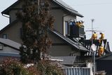 thumbnail: SENDAI, JAPAN - MARCH 14:  Members of a rescue team climb into a house after a warning of tsunami is issued after a 9.0 magnitude strong earthquake struck on March 11 off the coast of north-eastern Japan, on March 14, 2011 in Sendai, Japan. The quake struck offshore at 2:46pm local time, triggering a tsunami wave of up to 10 metres which engulfed large parts of north-eastern Japan. The death toll is currently unknown, with fears that the current hundreds dead may well run into thousands.  (Photo by Kiyoshi Ota/Getty Images)