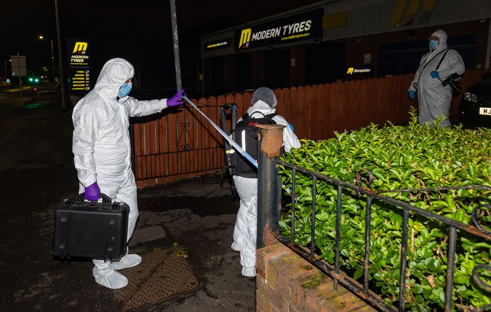 Police at the scene of the murder in east Belfast overnight. Photo: Kevin Scott