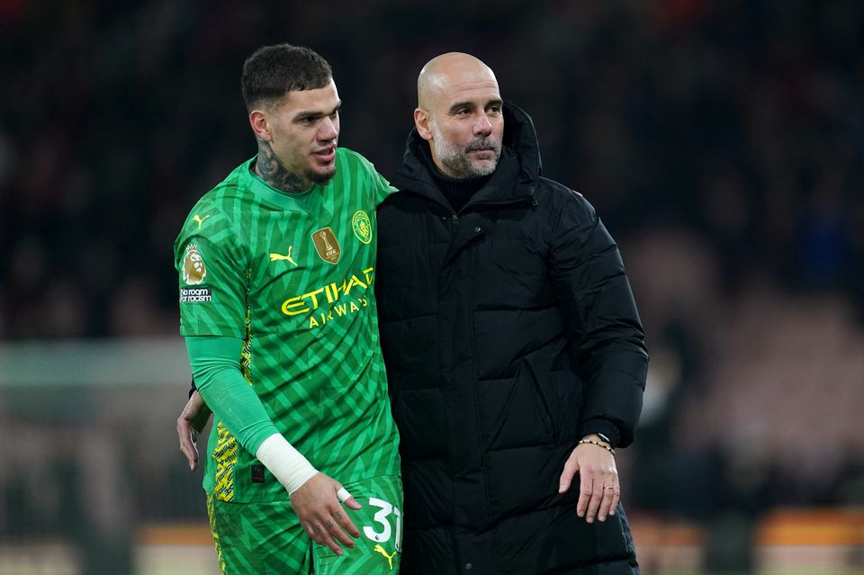 Pep Guardiola, right, feared Ederson, left, could leave Manchester City in the summer (Adam Davy/PA)