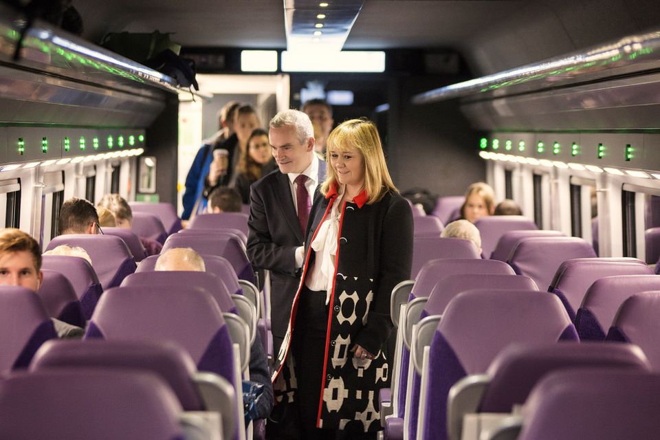 Regional Development Minister Michelle McIlveen and Chris Conway, Group Chief Executive for Translink, on board the first refurbished Enterprise train
