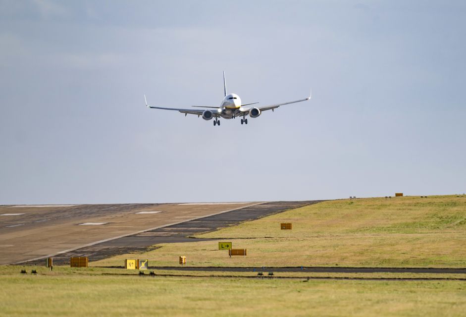 A plane lands at Leeds Bradford Airport (Danny Lawson/PA)