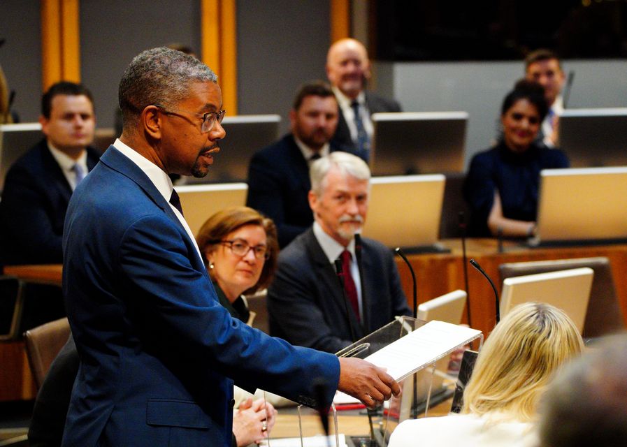 First Minister of Wales Vaughan Gething, next to Eluned Morgan and Huw Irranca-Davies in the Senedd (Ben Birchall/PA)