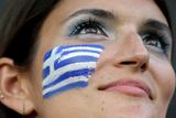 thumbnail: A Greek supporter waits for the start of the World Cup round of 16 soccer match between Costa Rica and Greece at the Arena Pernambuco in Recife, Brazil, Sunday, June 29, 2014. (AP Photo/Andrew Medichini)