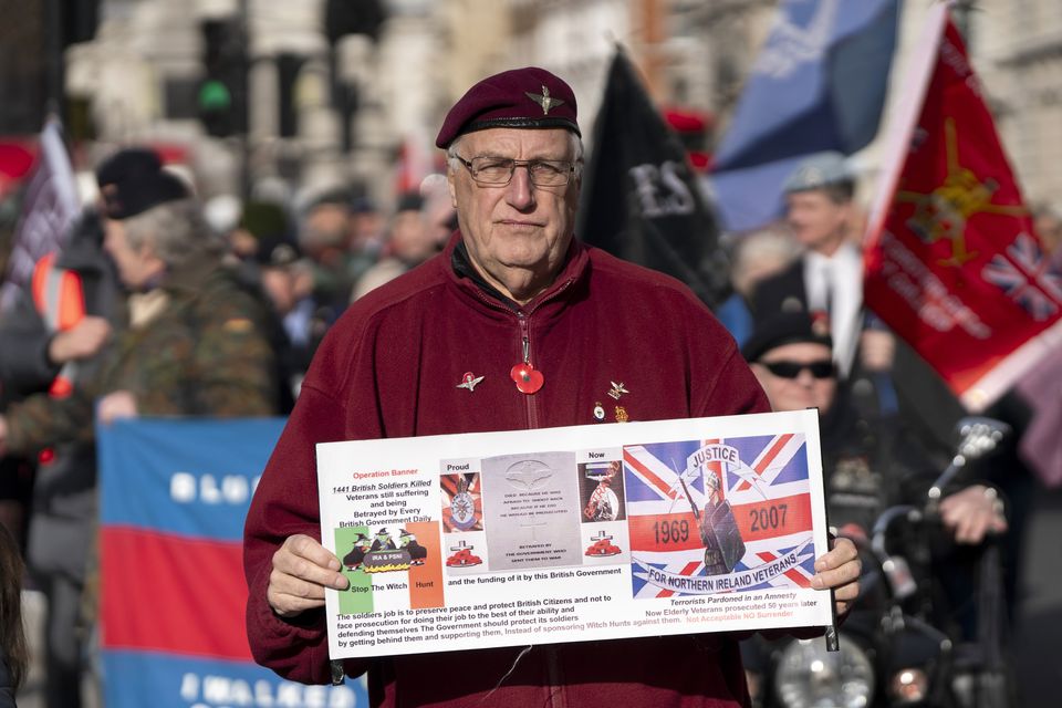 Veterans of the British military who served in Northern Ireland during the Troubles march along Whitehall, London, to protest about veterans being prosecuted (Ben Whitley/PA)