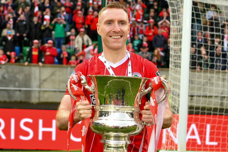 Chris Curran with the Irish Cup after his final game for Cliftonville
