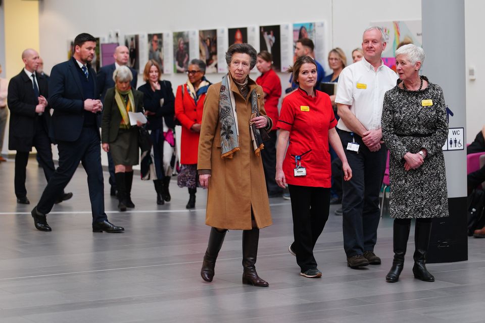 Anne walks through the atrium of Southmead Hospital’s Brunel Building (Ben Birchall/PA)