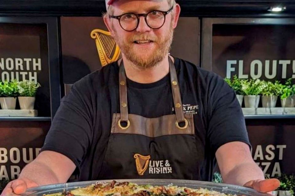 Pete Thompson with his latest Guinness-inspired pizza