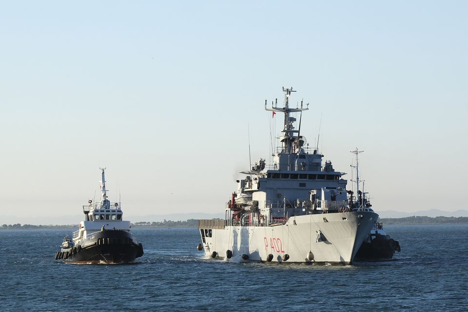 The Italian navy ship Libra arrives at the port of Shengjin (Vlasov Sulaj/AP)