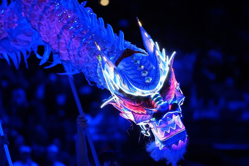 Performers honoured the Year of the Snake before an NBA basketball game between the Washington Wizards and the Dallas Mavericks (AP)