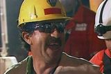 thumbnail: In this screen grab taken from video, Juan Andres Illanes, the third miner to be rescued, celebrates after his rescue Wednesday, Oct. 13, 2010 at San Jose Mine near Copiapo, Chile. (AP Photo)