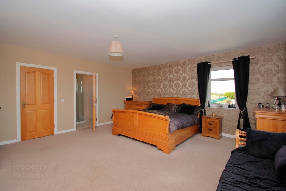 The principal bedroom has a dressing space and ensuite
