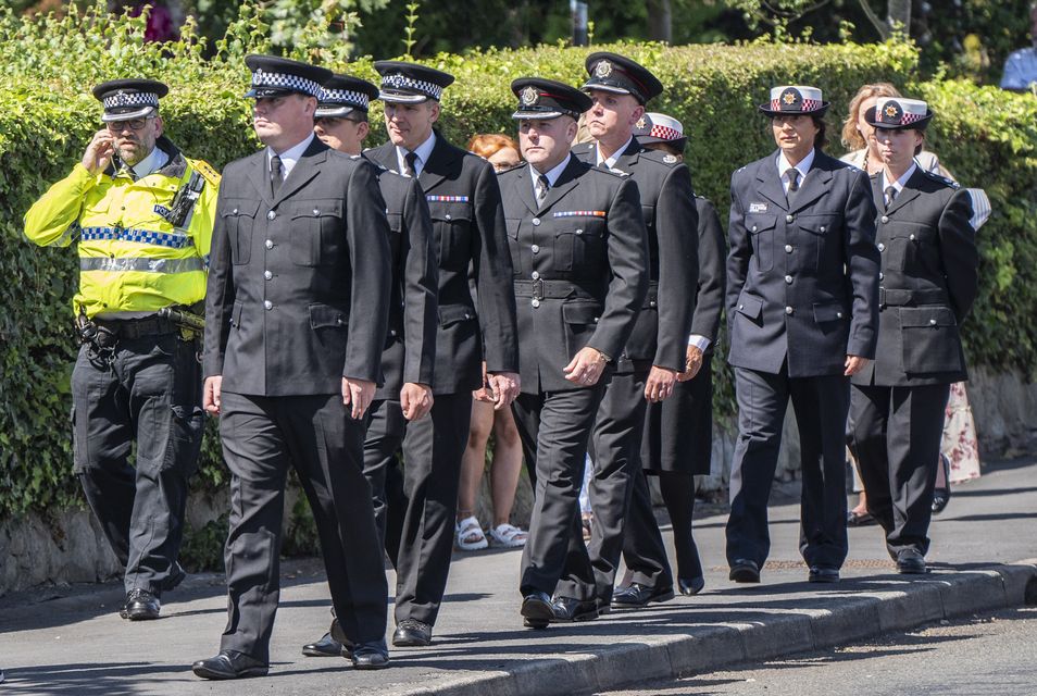 Police officers outside St Patrick’s Church, Southport, ahead of the funeral of stabbing victim Alice da Silva Aguiar (Danny Lawson/PA)