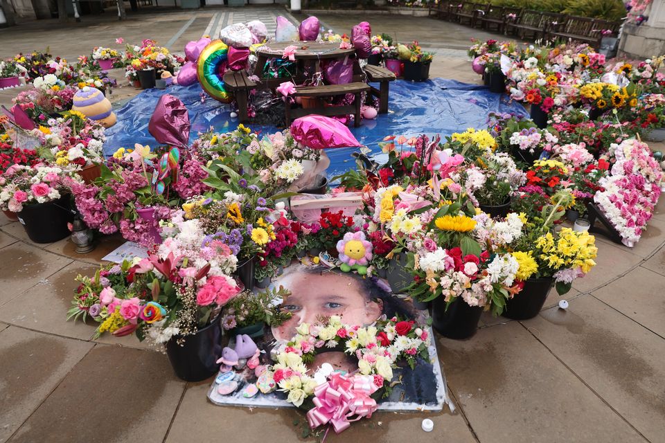 Flowers and tributes outside the Atkinson Art Centre in Southport for the three girls who died in Axel Rudakubana’s knife attack in Southport (Paul Currie/PA)