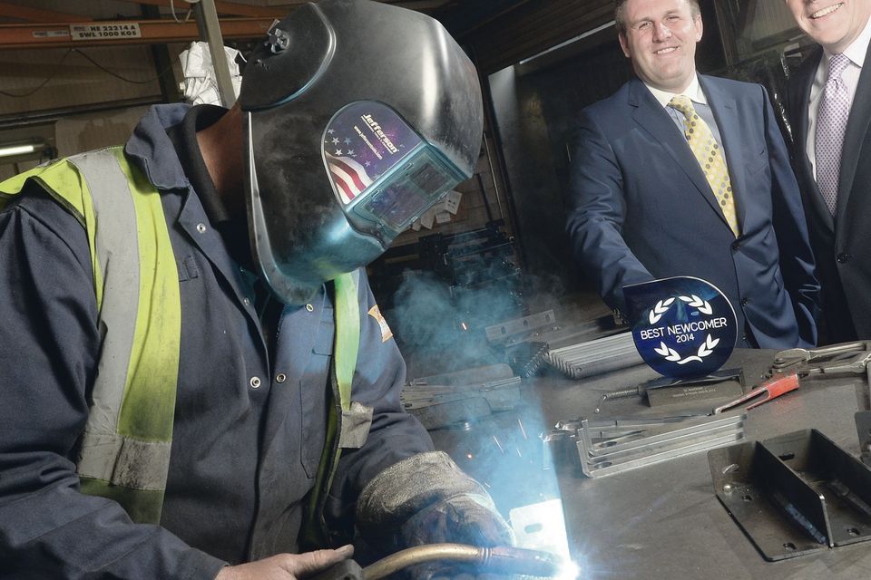 Co Londonderry manufacturing company SJC Hutchinson Engineering has been named has been named best newcomer in the first Investors in People Awards. Managing director Mark Hutchinson (l) celebrated the accolade with Martin Clarke, economic development officer of Coleraine Borough Council