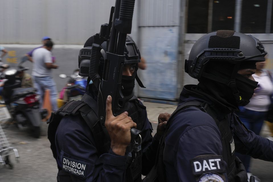 Police leaving the Boleita National Police detention centre where some people arrested during recent opposition protests against the official results of the election are held in Caracas, Venezuela (AP Photo/Matias Delacroix)