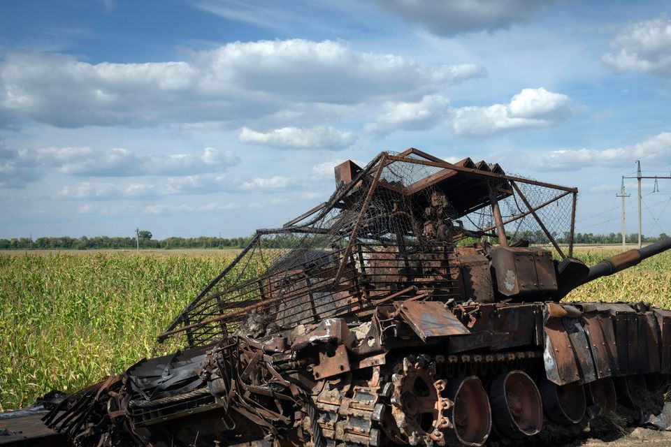 A destroyed Russian tank sits on a roadside near the town of Sudzha, in the Kursk region of Russia (AP)