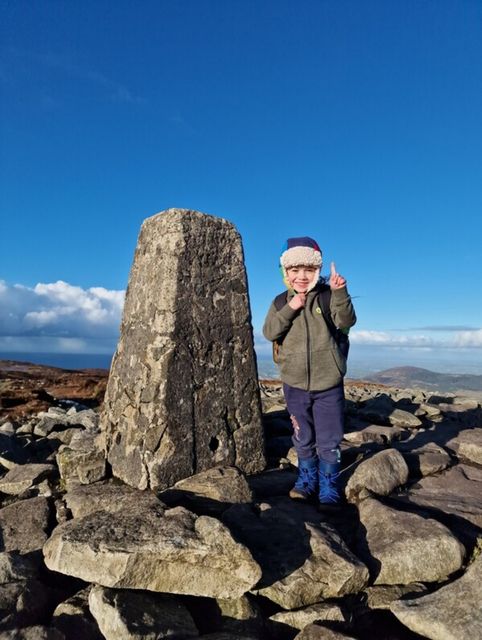 Leon during his first hike of 32 at the peak of Slieve Gullion