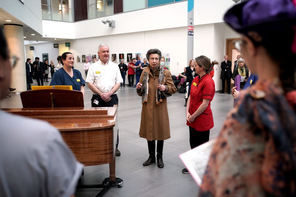 Anne speaks with the choir who performed during her visit (Ben Birchall/PA)