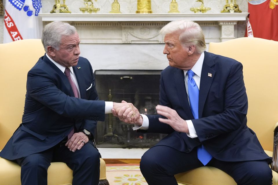 President Donald Trump greets Jordan’s King Abdullah II in the Oval Office at the White House (Alex Brandon/AP)