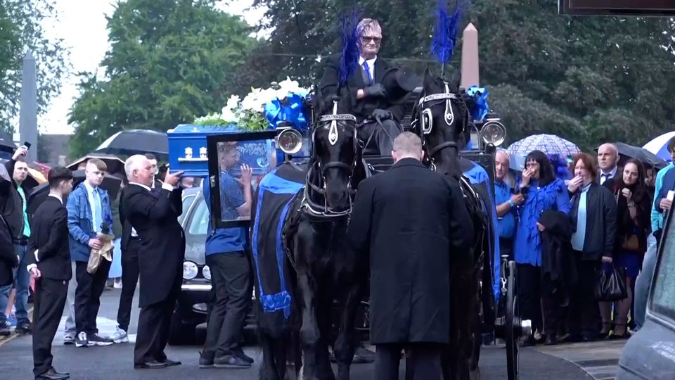 Mourners wore blue to honour the teenager’s life (Acacia Redding/PA)