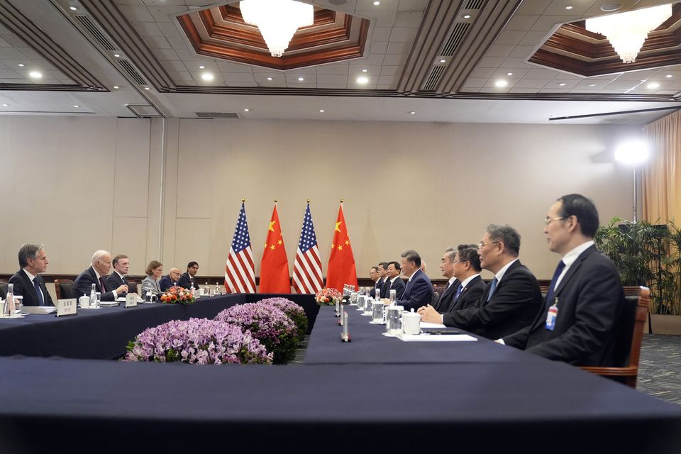 Mr Biden and Mr Xi during their bilateral meeting in Lima (Manuel Balce Ceneta/AP)