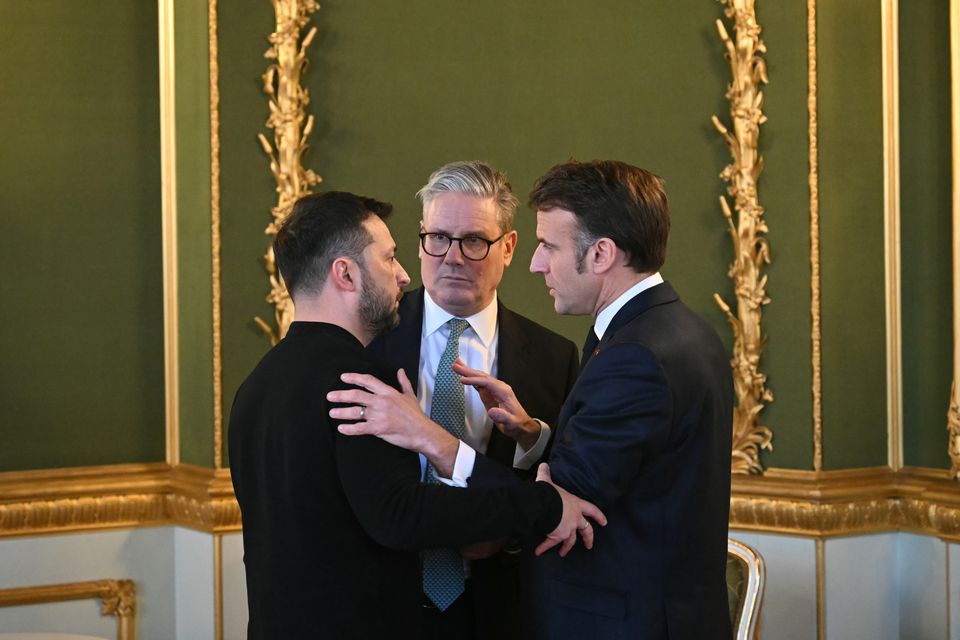 Ukraine’s President Volodymyr Zelensky, Prime Minister Sir Keir Starmer and France’s President Emmanuel Macron speak during a leaders’ summit on the situation in Ukraine (PA)