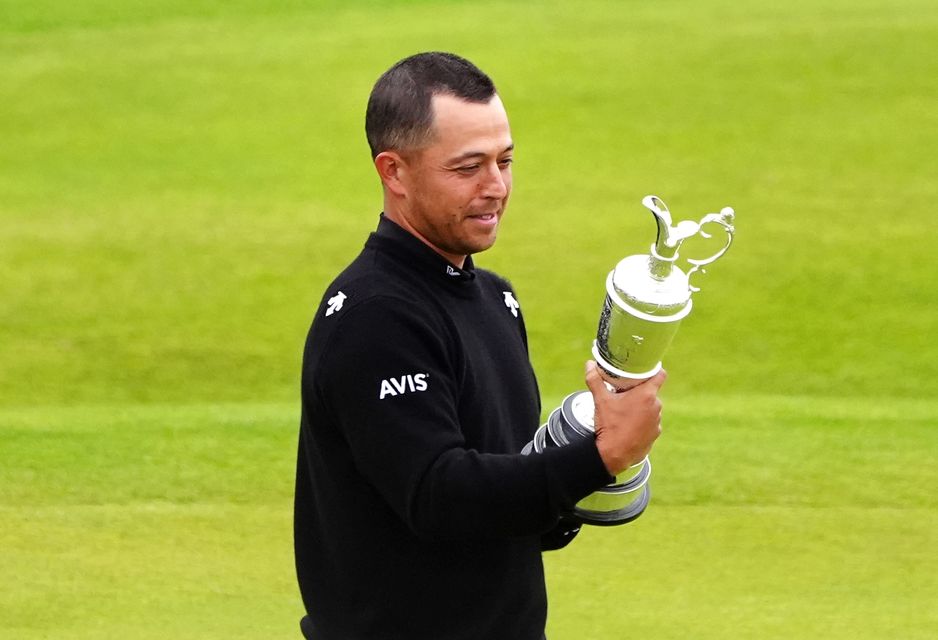 Xander Schauffele celebrates with the Claret Jug after winning The 152nd Open at Royal Troon (Jane Barlow/PA)