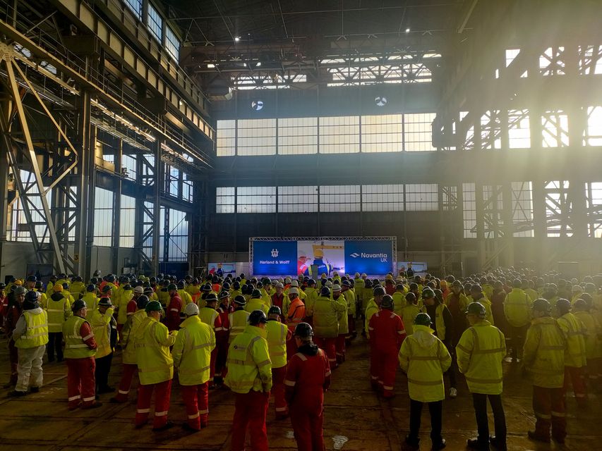 The workforce at Harland & Wolff in Belfast listen to speeches marking its sale to Navantia