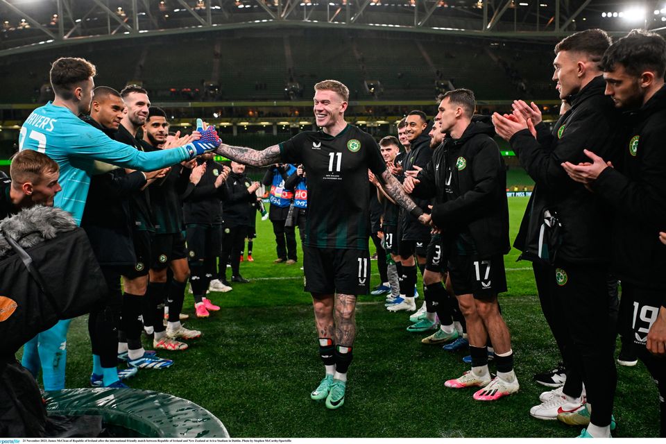 James McClean is given a guard of honour by his team-mates after his final international game