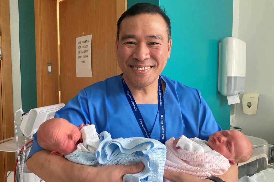 Vince Rosales with twins Aoife and Shea McGorrian