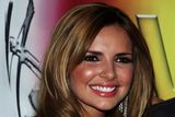 thumbnail: LONDON - FEBRUARY 18:  Nadine Coyle of Girls Aloud poses after winning the Best British Single backstage at the Brit Awards 2009 at Earls Court on February 18, 2009 in London, England.  (Photo by Tim Whitby/Getty Images)