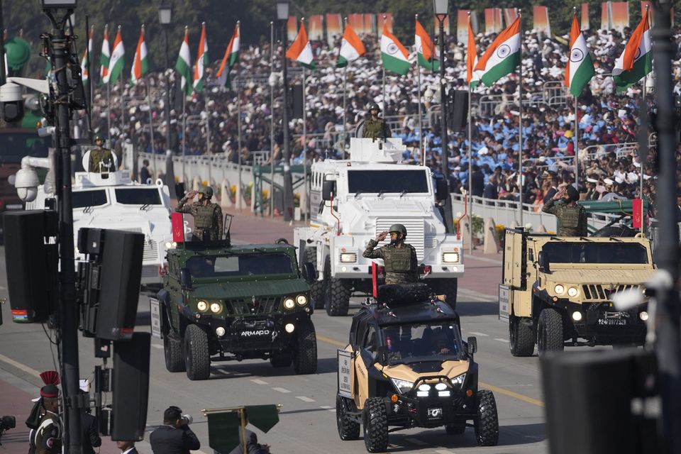 Indian defence forces march through the ceremonial Kartavya Path boulevard (Channi Anand/AP)