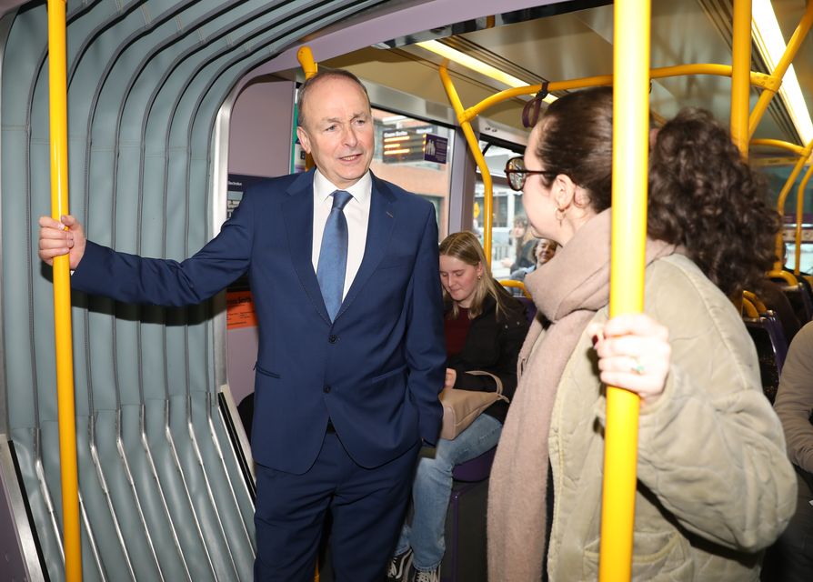 Tanaiste and Fianna Fail leader Micheal Martin’s campaign saw him take a Luas tram in the capital (Gareth Chaney/PA)