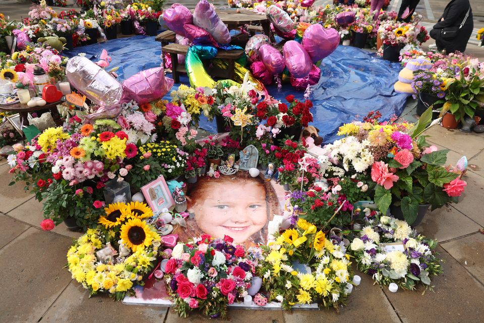 Photo of Elsie Dot Stancombe among the flowers and tributes (Paul Currie/PA)