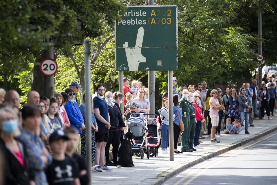 Members of the public lined the streets for the funeral cortege of Xander Irvine (Jane Barlow/PA)