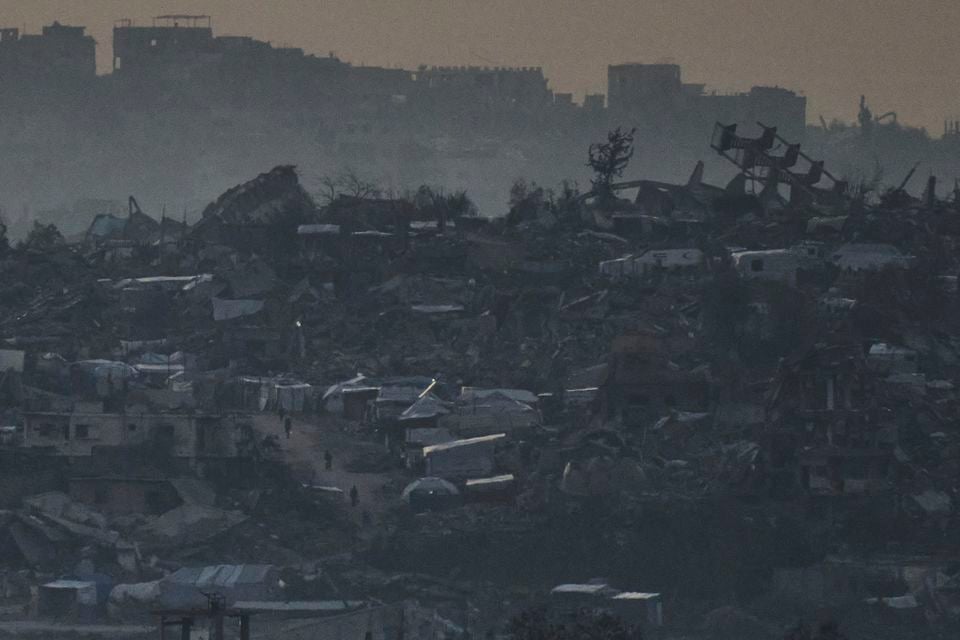 Buildings destroyed during an Israeli air and ground offensive in the Gaza Strip (Leo Correa/AP)