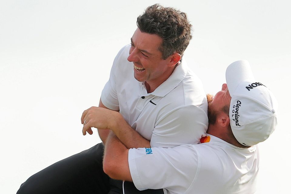 Shane Lowry lifts Rory McIlroy after the pair combined to win the Zurich Classic of New Orleans