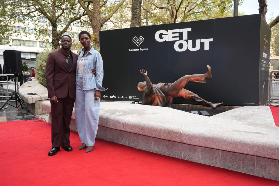 Jodie Turner-Smith and actor Daniel Kaluuya attend the unveiling of the statue, installed as part of the Scenes In The Square trail in Leicester Square (Lucy North/PA)