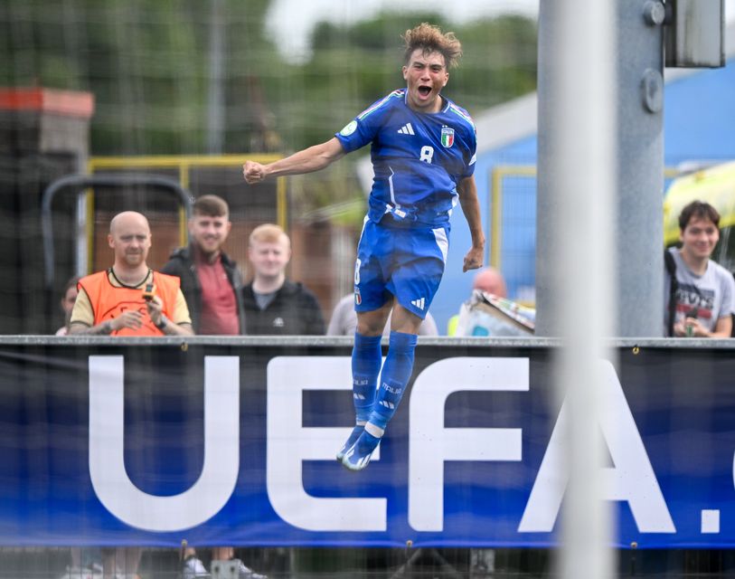 Italy's Luca Di Maggio celebrates after scoring his side's first goal in their Under-19 Euro win over Norway